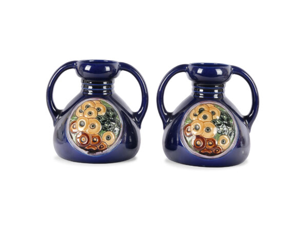 Pair of flower vases with handles