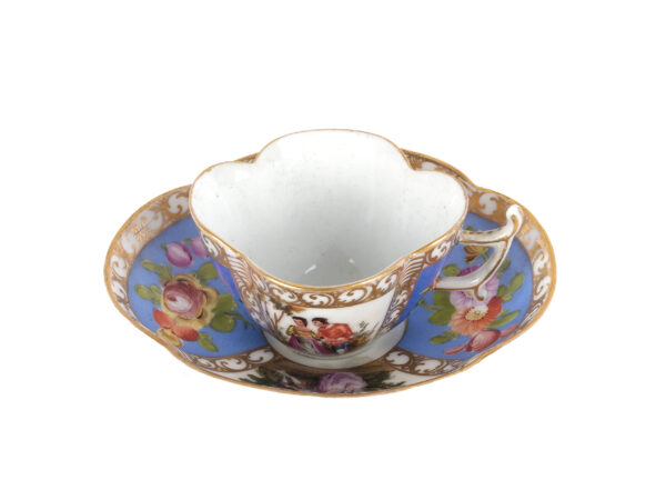 Cup with oval saucer