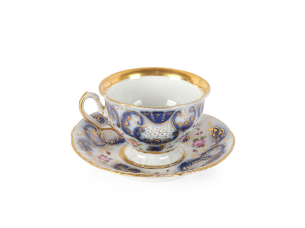 Cup with saucer